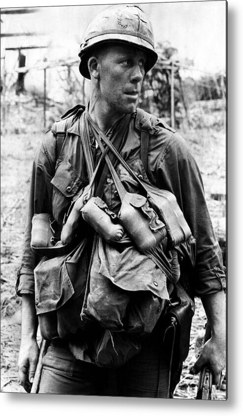 1960s Candids Metal Print featuring the photograph A U.s. Soldier With The U.s. 1st by Everett