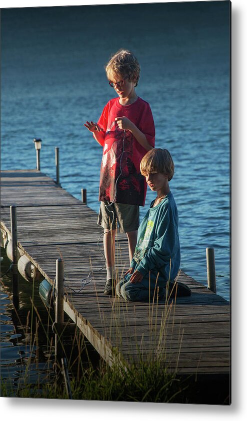 Dock Metal Print featuring the photograph Boys on a Wooden Boat Dock in Late Afternoon by Randall Nyhof