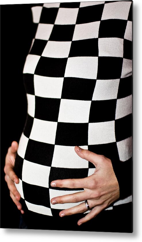 Black Metal Print featuring the photograph Chequered pregnancy by Gabor Pozsgai