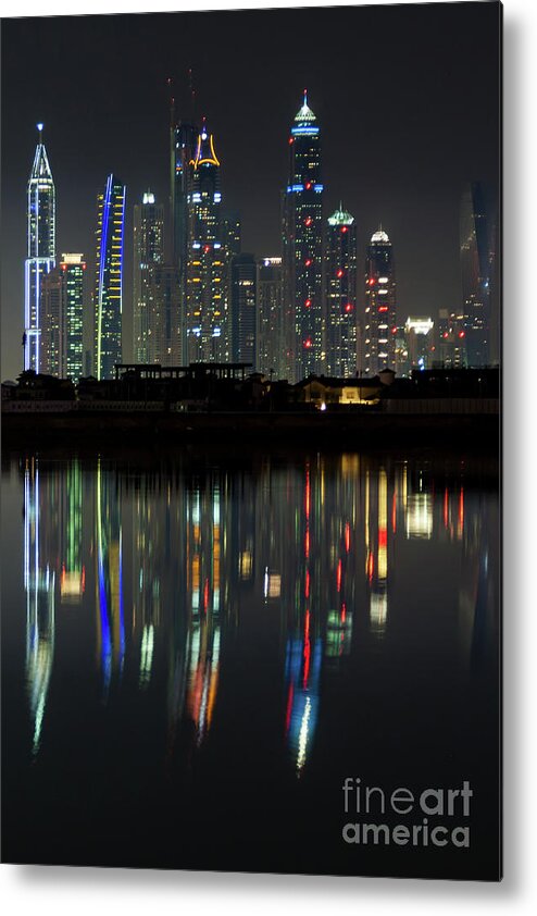Dubai Metal Print featuring the photograph Dubai city skyline nighttime by Andy Myatt