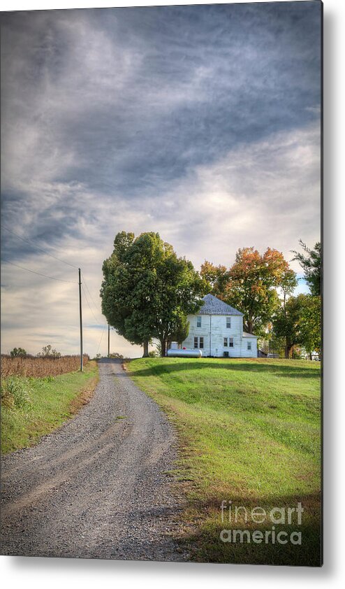 Driving Metal Print featuring the photograph House on a Gravel Road by Larry Braun