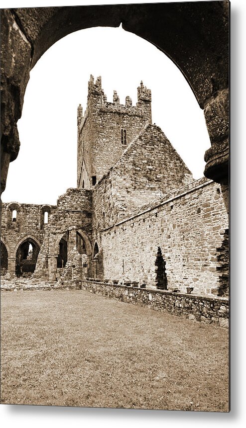 Jerpoint Metal Print featuring the photograph Jerpoint Abbey Church Tower Under Cloister Arch County Kilkenny Ireland Sepia by Shawn O'Brien