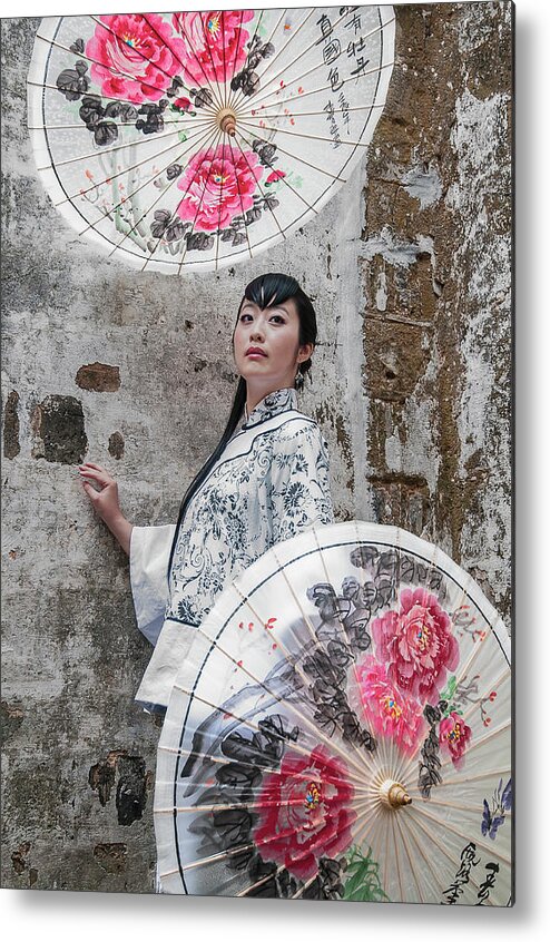 Asia Metal Print featuring the photograph Lady with an umbrella. by Usha Peddamatham