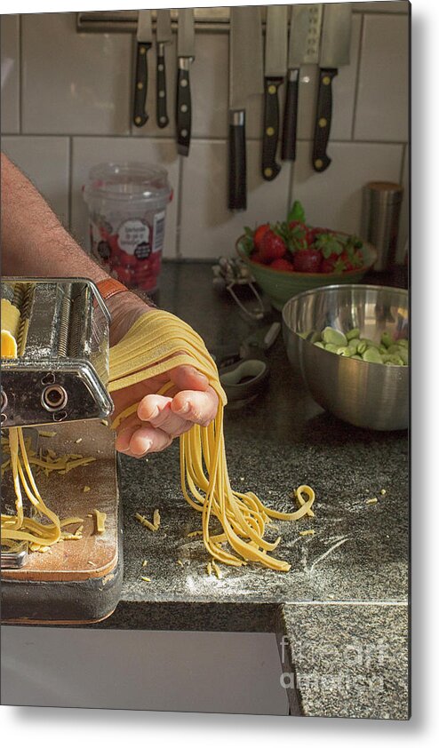 Close-up Metal Print featuring the photograph Making pasta in the kitchen by Patricia Hofmeester