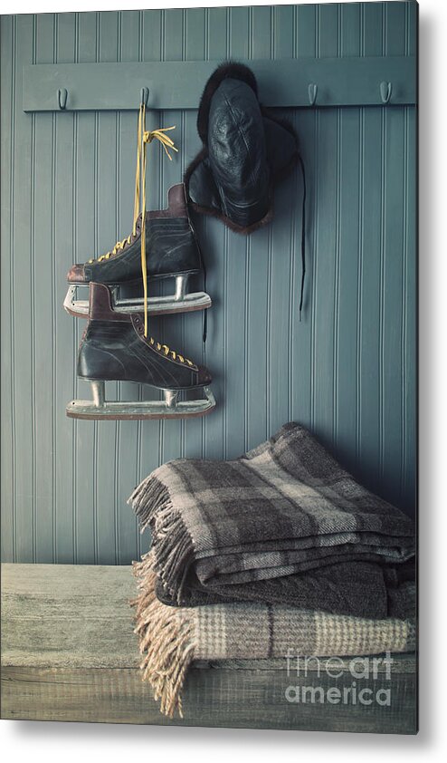 Aging Metal Print featuring the photograph Men's vintage skates and hat hanging on hook by Sandra Cunningham