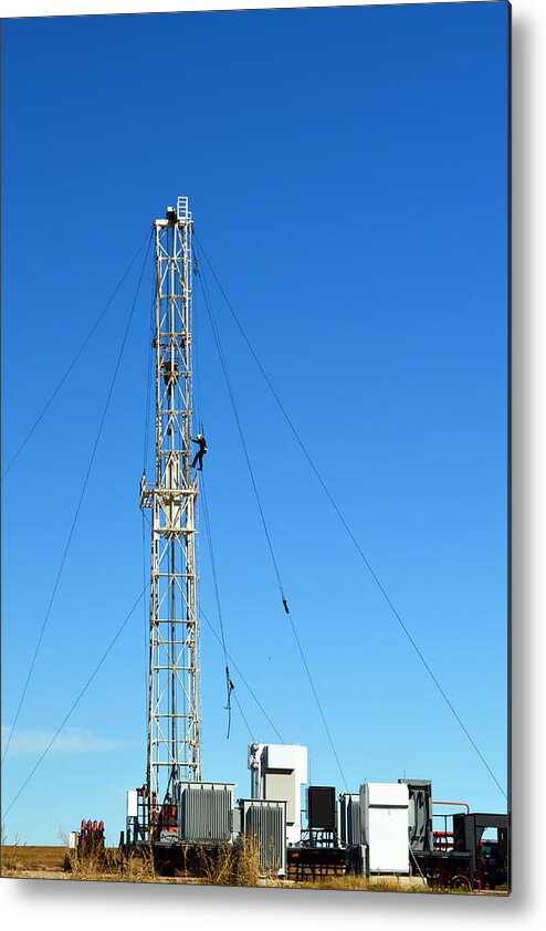 Oil Metal Print featuring the photograph Oil Field Man At Work - photography by Ann Powell