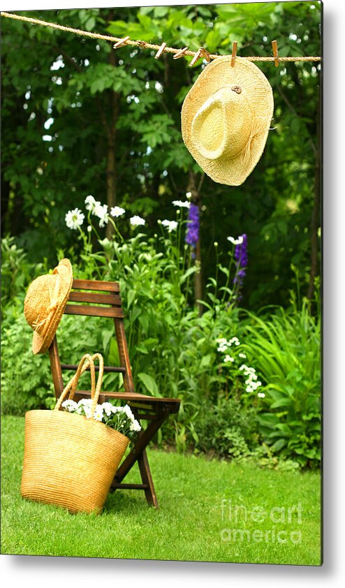 Breeze Metal Print featuring the digital art Straw hat hanging on clothesline by Sandra Cunningham