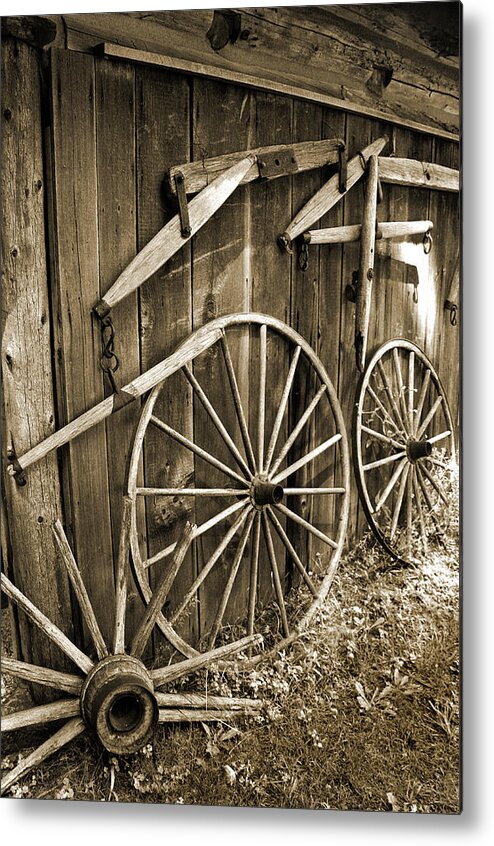 Wagon Wheels Metal Print featuring the photograph Wagon Wheels 2 by Joanne Coyle