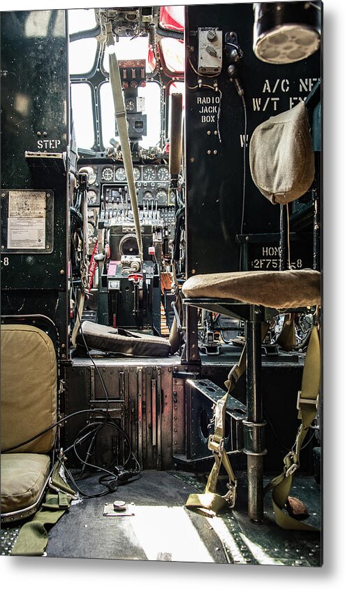 This Is A Photograph Of The Cockpit Of A World War Ii Era Bomber From The United States. It Is Shot From Inside The Fuselage. Metal Print featuring the photograph WWII B-24J Liberator Bomber Cockpit by Artful Imagery