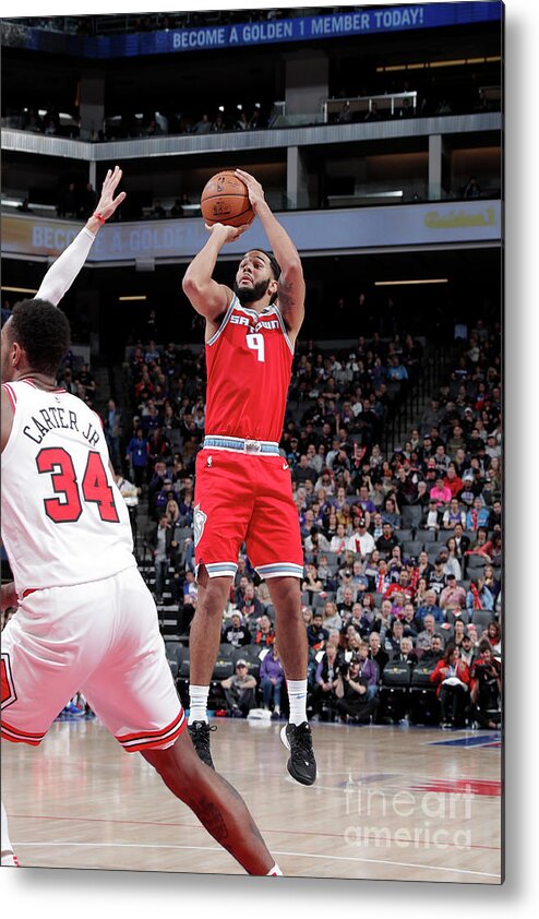 Cory Joseph Metal Print featuring the photograph Chicago Bulls V Sacramento Kings by Rocky Widner