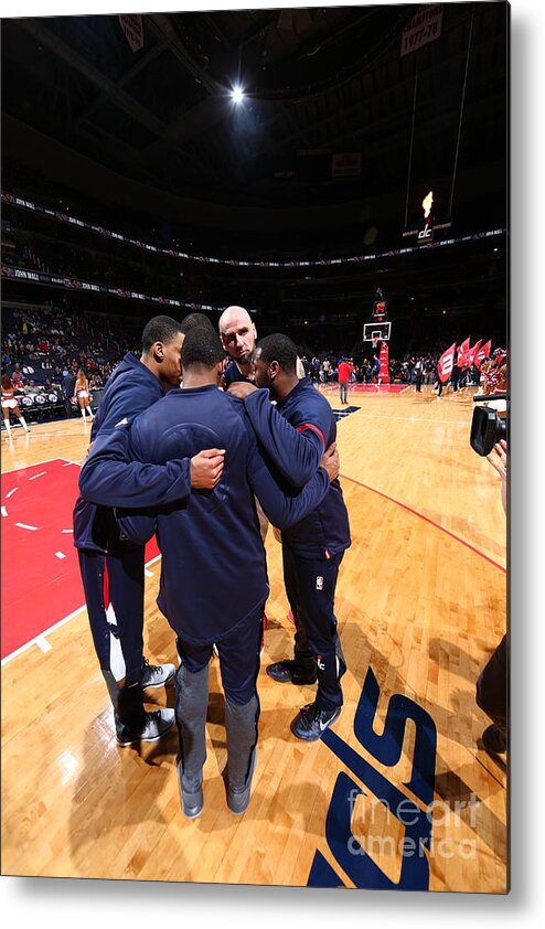 The Washington Wizards Metal Print featuring the photograph New York Knicks V Washington Wizards by Ned Dishman