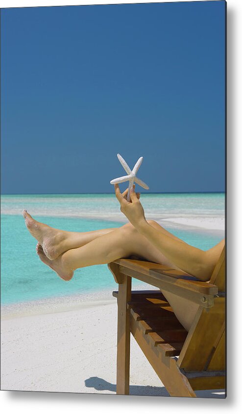 Woman Holding Seastar On The Beach Metal Print featuring the photograph 795-147 by Robert Harding Picture Library