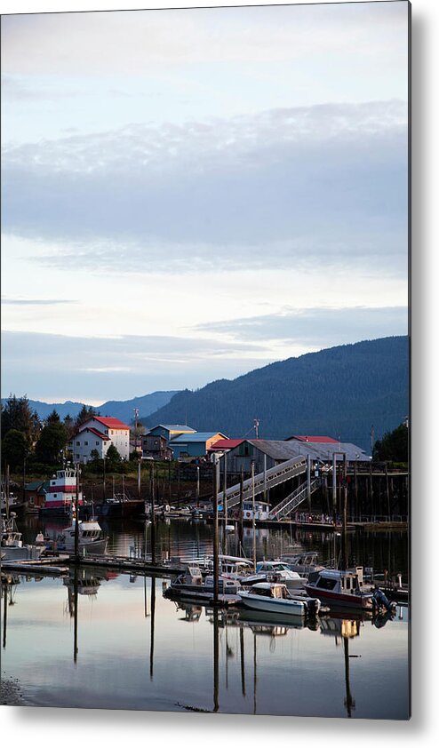 Sailboat Metal Print featuring the photograph A Marina At Dusk Near In The Town Of by Michael Hanson