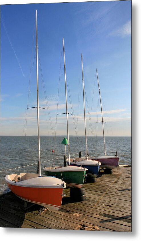 Tranquility Metal Print featuring the photograph Boats At Sea by M D Baker