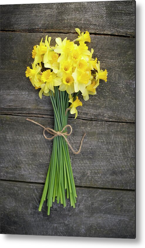 Outdoors Metal Print featuring the photograph Bunch Of Daffodils On A Wooden Table by Dougal Waters