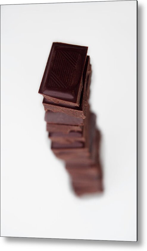 Unhealthy Eating Metal Print featuring the photograph Chocolates Stacked Into Tower by Asia Images