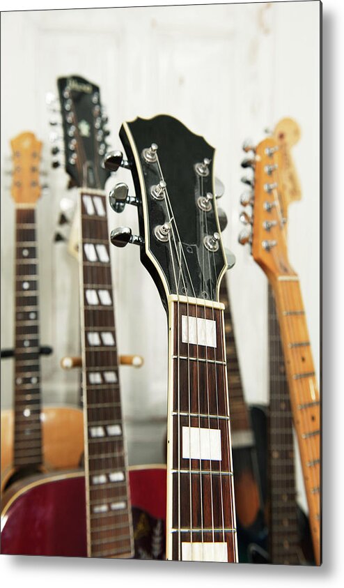 Recreational Pursuit Metal Print featuring the photograph Close Up Of Various Guitars by Johner Images