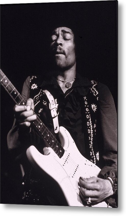 Rock Music Metal Print featuring the photograph Jimi Hendrix Performs by Hulton Archive