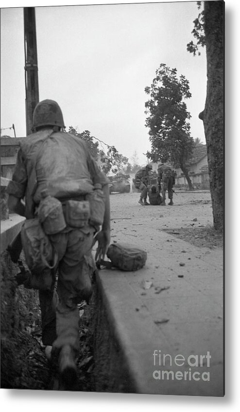 Vietnam War Metal Print featuring the photograph Marines Fighting In Streets Of Hue by Bettmann