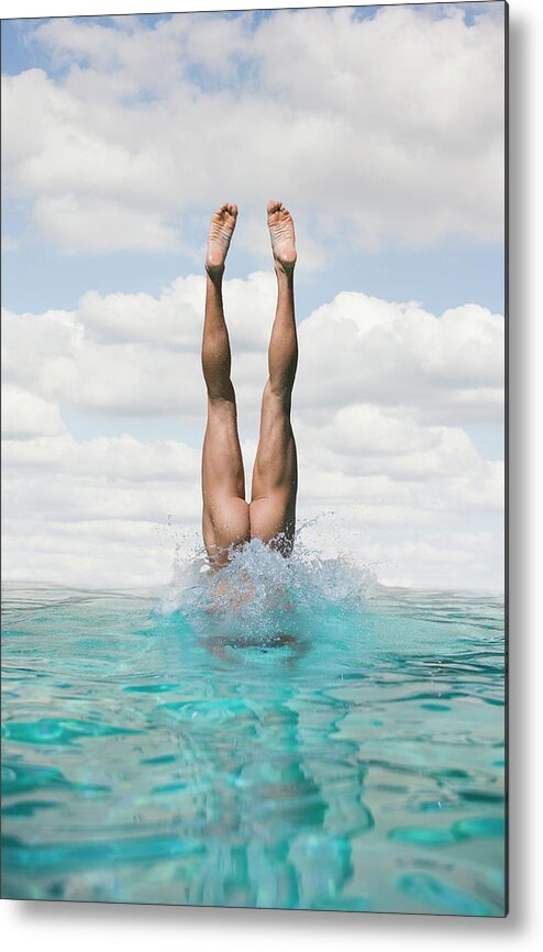 Diving Into Water Metal Print featuring the photograph Nude Man Diving by Ed Freeman