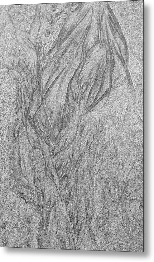 Abstract Metal Print featuring the photograph Patterns left by the receding water in the sand of a beach - monochrome by Intensivelight