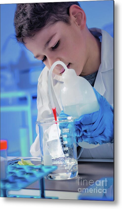 Education Metal Print featuring the photograph Schoolboy Using Lab Equipment by Microgen Images/science Photo Library
