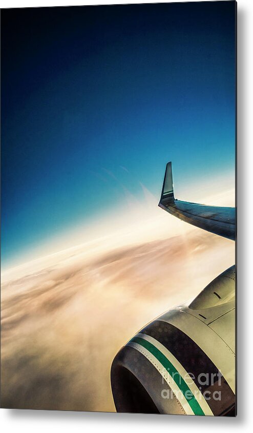 Amyn Nasser Metal Print featuring the photograph Sleek Jet Blue Sky Aerial by Neptune - Amyn Nasser Photographer