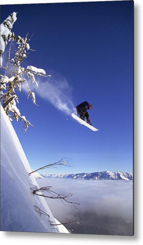 People Metal Print featuring the photograph Snowboarder In Mid-air by Comstock Images
