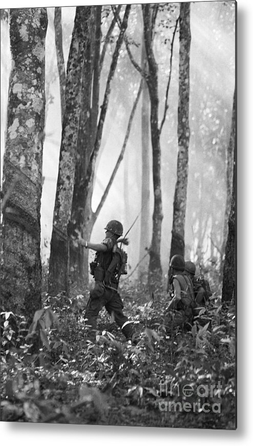 Vietnam War Metal Print featuring the photograph Soldier Throwing Hand Grenade by Bettmann