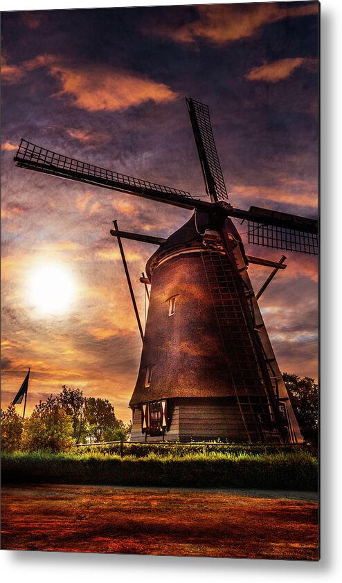 Clouds Metal Print featuring the photograph Sundown over Holland by Debra and Dave Vanderlaan