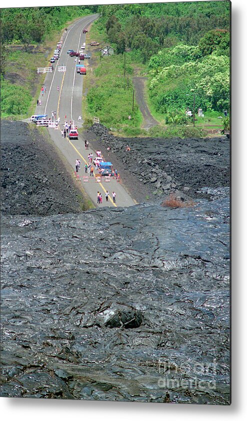 Hawaii Volcanoes National Park Metal Print featuring the photograph Volcanic Lava On Highway 130 by Bettmann