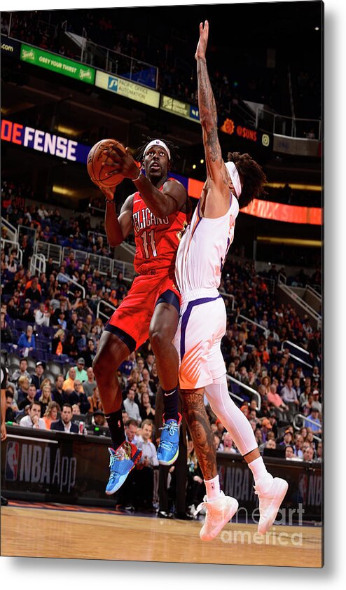 Jrue Holiday Metal Print featuring the photograph Jrue Holiday by Barry Gossage