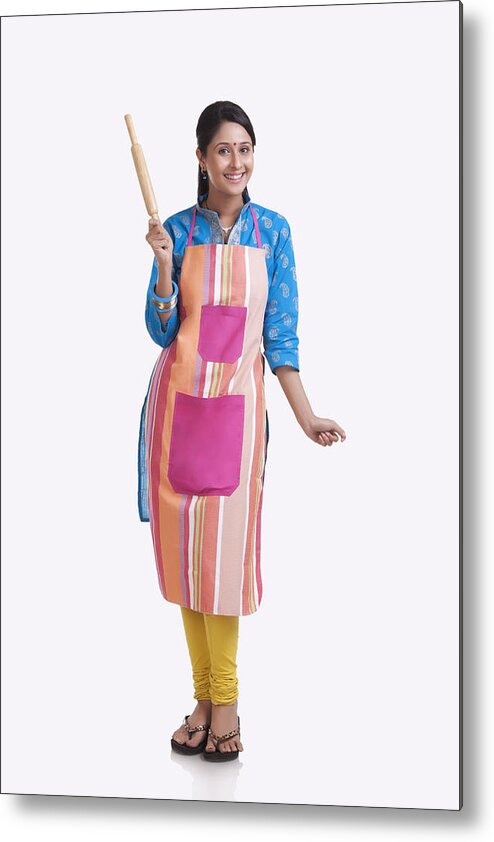 Homemaker Metal Print featuring the photograph Portrait of a young WOMEN wearing an apron #1 by Sudipta Halder
