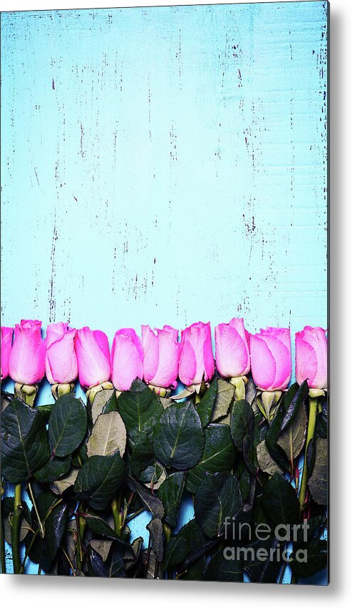 Anniversary Metal Print featuring the photograph Vintage aqua blue wood background with pink rose buds. #1 by Milleflore Images