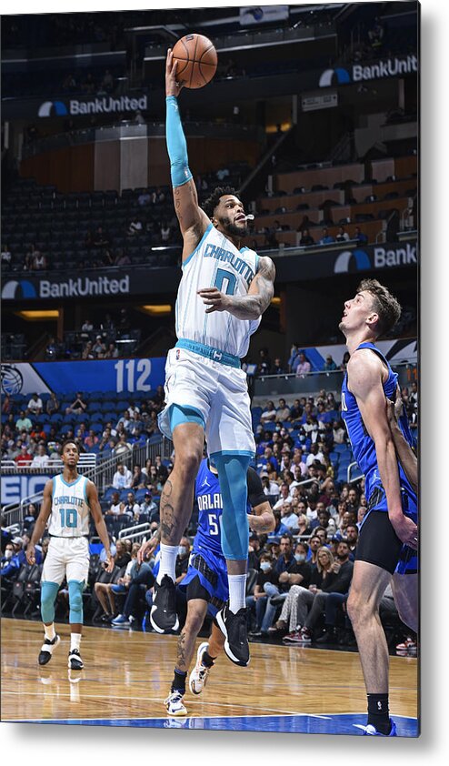 Miles Bridges Metal Print featuring the photograph Charlotte Hornets v Orlando Magic by Gary Bassing