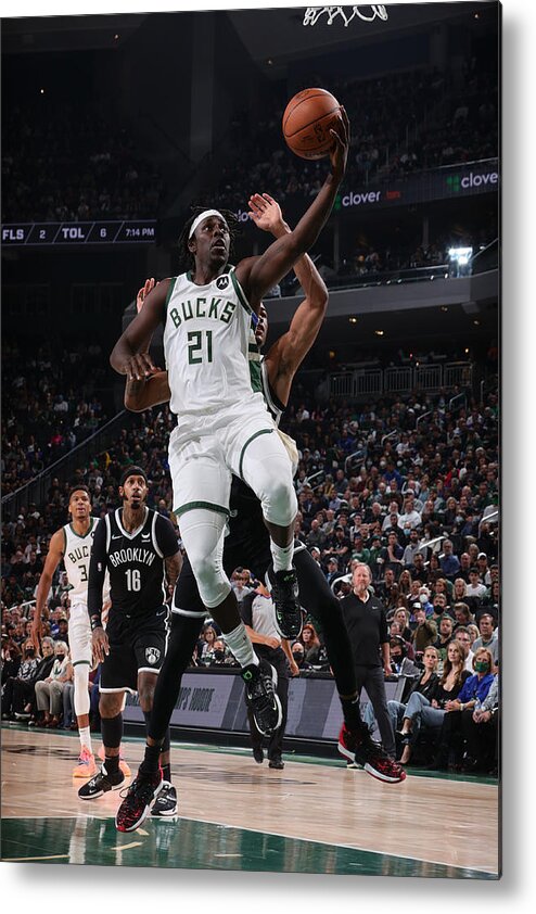 Jrue Holiday Metal Print featuring the photograph Jrue Holiday by Nathaniel S. Butler