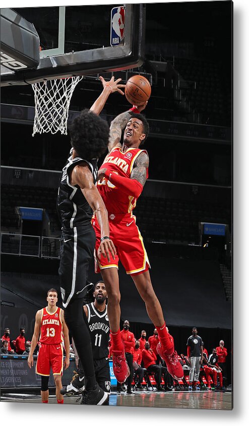Nba Pro Basketball Metal Print featuring the photograph John Collins by Nathaniel S. Butler