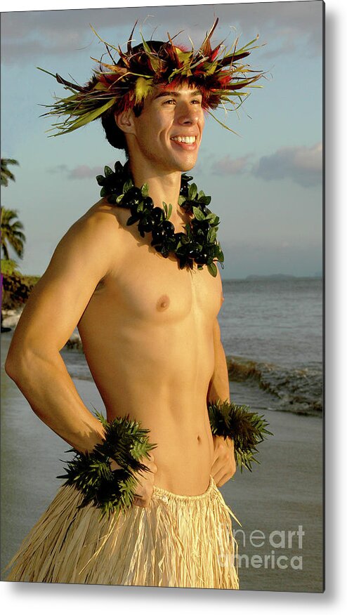Male Hula Dancer Metal Print featuring the photograph A smiling male hula dancer poses on the beach. by Gunther Allen