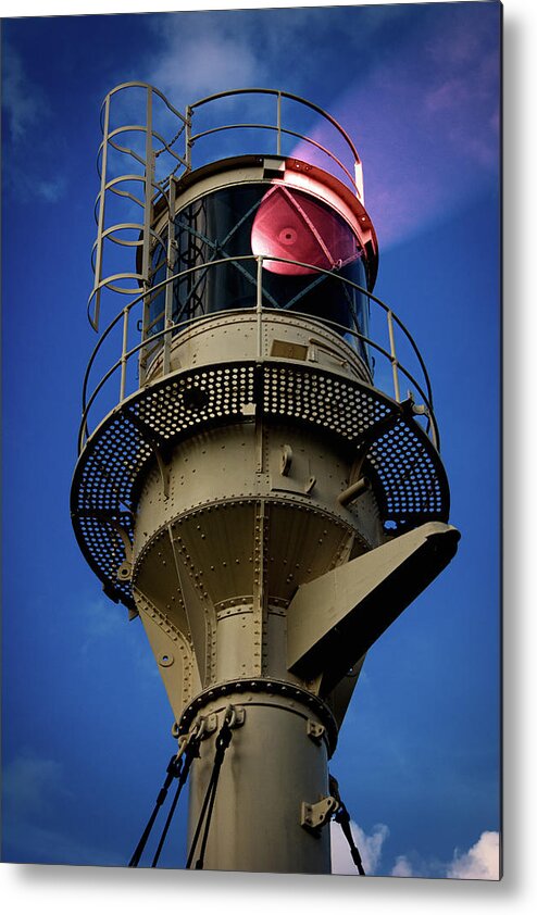 Lighthouse Metal Print featuring the photograph Beam of light from a lighthouse. by Bernhard Schaffer