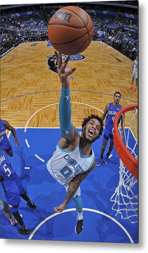 Nba Pro Basketball Metal Print featuring the photograph Charlotte Hornets v Orlando Magic by Fernando Medina