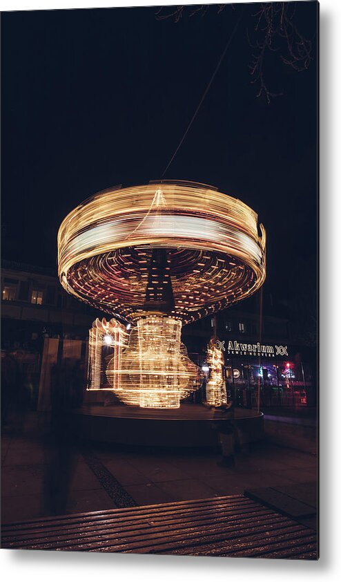 Illuminations Metal Print featuring the photograph Christmas carousel on the streets of Warsaw. Fire Wheel by Vaclav Sonnek