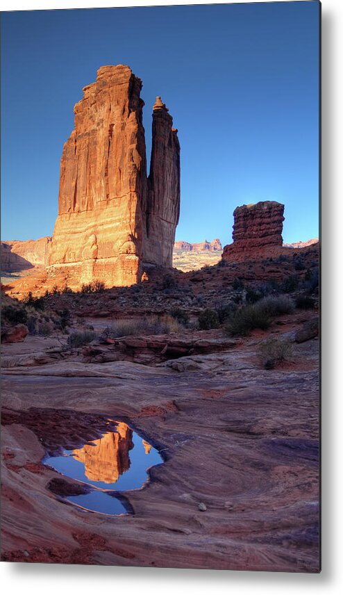 Courthouse Towers Metal Print featuring the photograph Courthouse Towers and pool reflection Park Avenue at Arches National Park by Peter Herman