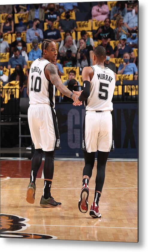 Demar Derozan Metal Print featuring the photograph Demar Derozan and Dejounte Murray by Joe Murphy