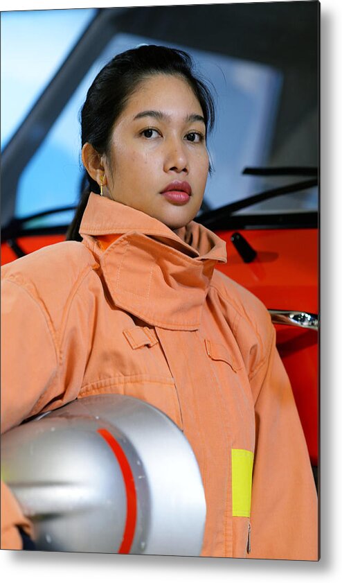 Orange Color Metal Print featuring the photograph Female firefighter by Electravk