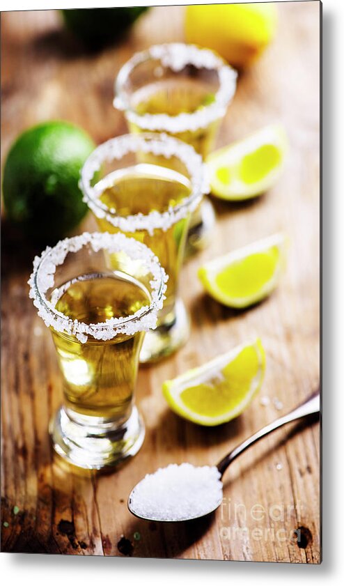 Tequila Metal Print featuring the photograph Golden mexican tequila in shot glasses by Jelena Jovanovic