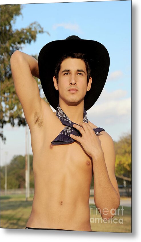 Body Metal Print featuring the photograph Handsome hispanic cowboy is wearing a black cowboy hat by Gunther Allen