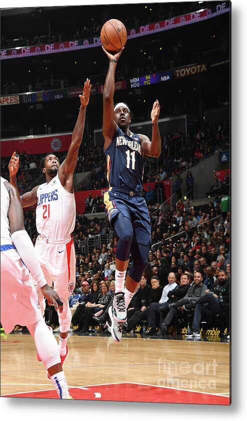 Jrue Holiday Metal Print featuring the photograph Jrue Holiday by Andrew D. Bernstein