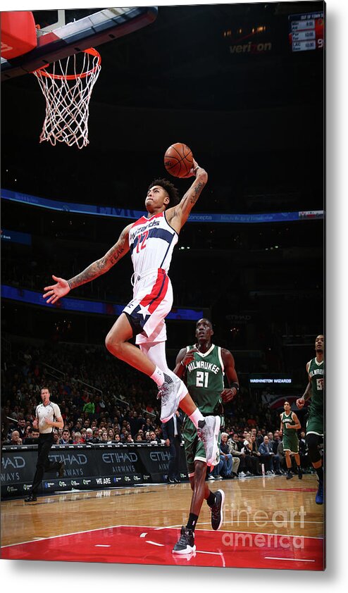 Nba Pro Basketball Metal Print featuring the photograph Kelly Oubre and Tony Snell by Ned Dishman