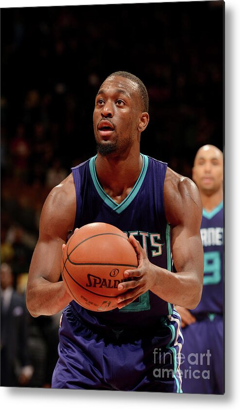Kemba Walker Metal Print featuring the photograph Kemba Walker by Ron Turenne