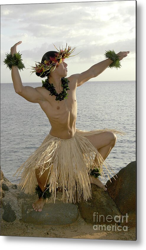 Beach Metal Print featuring the photograph Male Hula Dancer poses on the beach in a traditional sun worship move. by Gunther Allen
